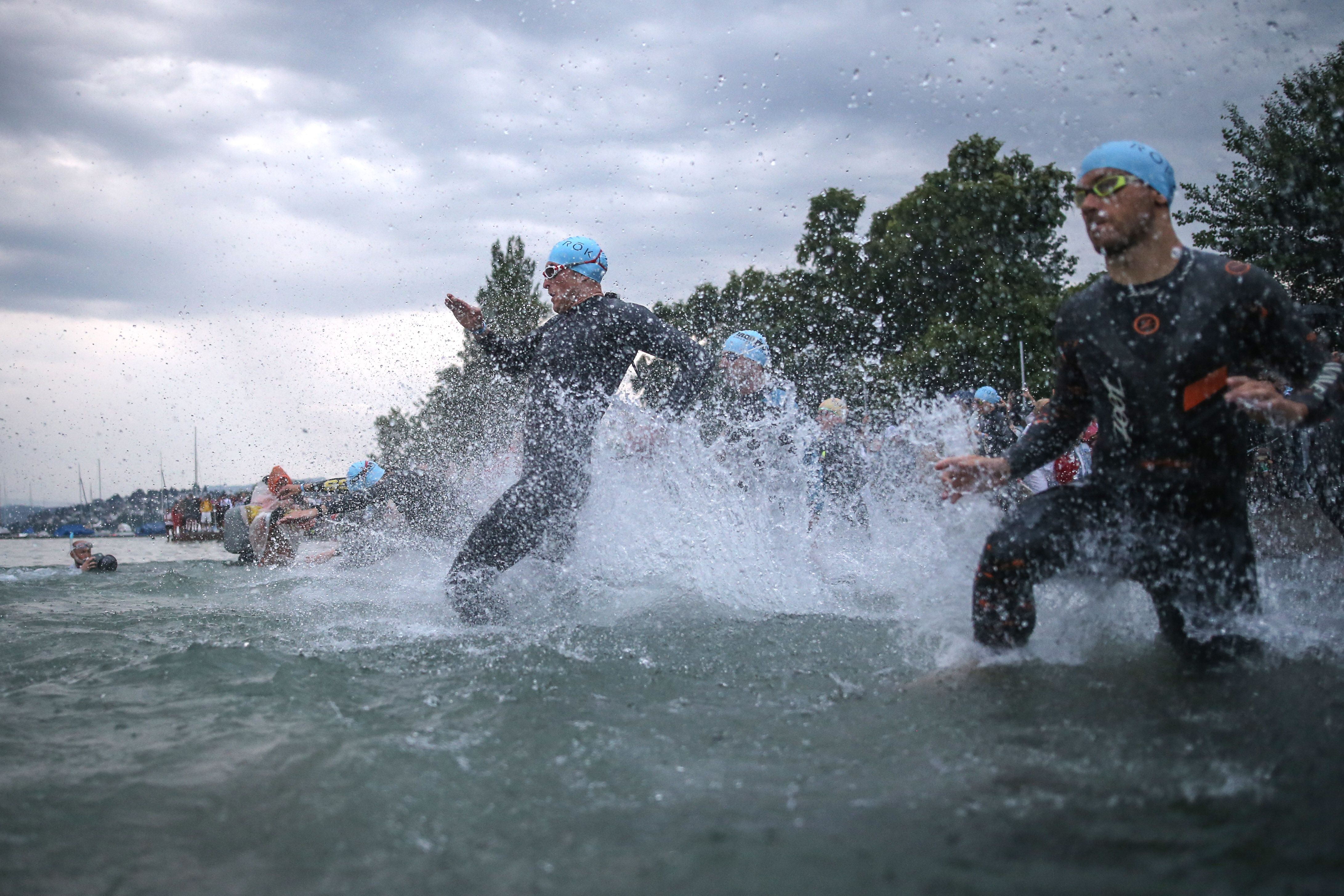 ZURICH, SWITZERLAND - JULY 21: Athletes compete in the swim leg of the men's race during IRONMAN Zurich on July 21, 2019 in Zurich, Switzerland. (Photo by Joern Pollex/Getty Images for IRONMAN)